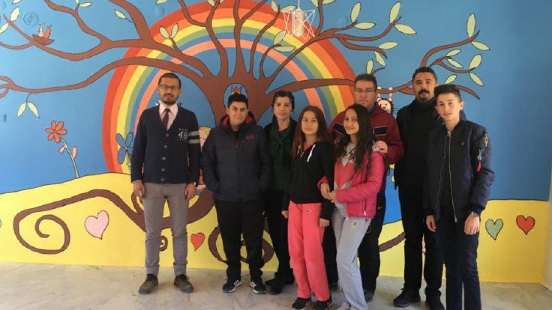 Karacasu İmam Hatip Ortaokulu öğrencileri Karacaören Şehit Mehmet Aykan İlkokuluna 2 bin kitaplık kütüphane kazandırdı